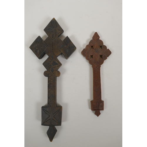 165 - An African carved wood Coptic Cross and another smaller, 31cm 