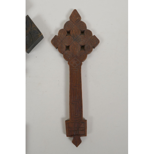 165 - An African carved wood Coptic Cross and another smaller, 31cm 