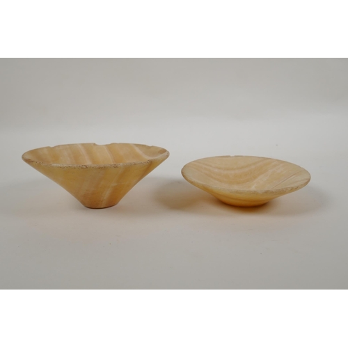 167 - A middle eastern carved alabaster conical bowl and another smaller, largest 13cm diameter