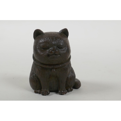 171 - An oriental bronze cat, 6cm high