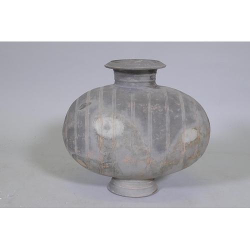 172 - A Chinese ceramic vessel with inscribed decoration, 37cm wide, 34cm high