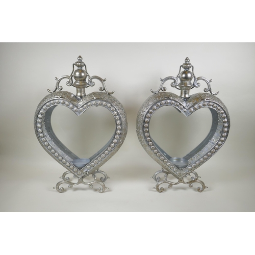 176 - A pair of silvered metal heart shaped lanterns, 51cm high