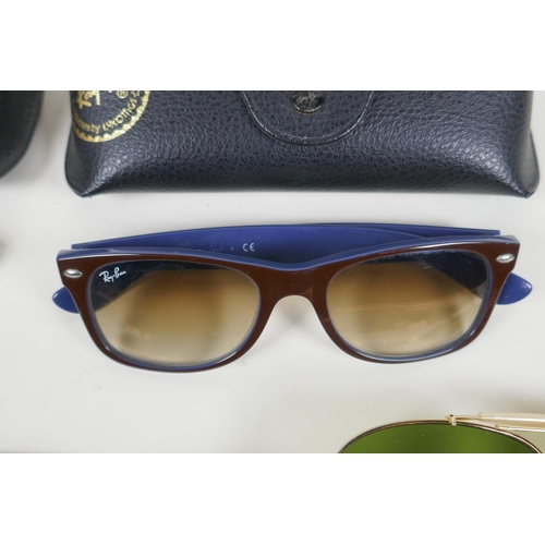 178 - A pair of Ray Ban New Wayfarer sunglasses, RB2132 74/51, a pair of Ray Ban top Bar RB3186 014/73, an... 