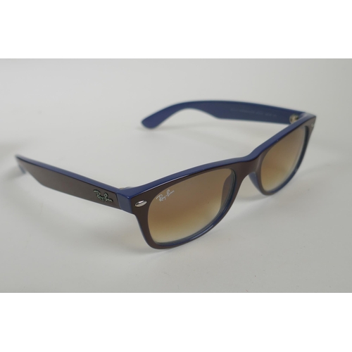 178 - A pair of Ray Ban New Wayfarer sunglasses, RB2132 74/51, a pair of Ray Ban top Bar RB3186 014/73, an... 