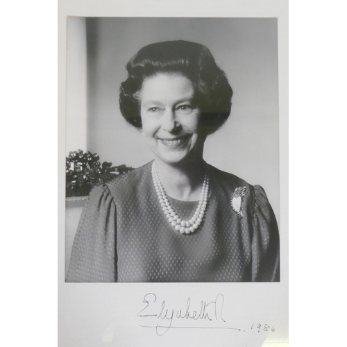 179 - An autographed photo of Her Majesty Queen Elizabeth II, bromide print by John Lawrence, signed Eliza... 