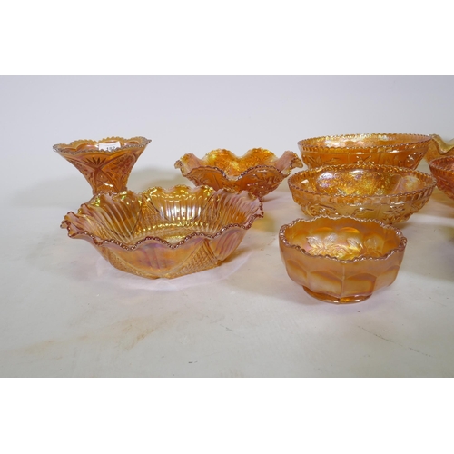 182 - Twelve pieces of vintage carnival glass, various shapes and sizes, largest 24cm diameter