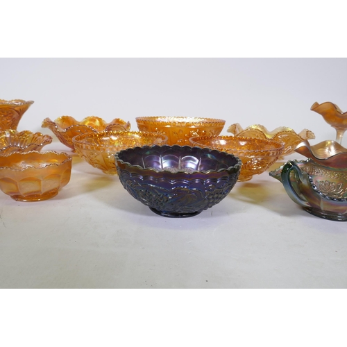 182 - Twelve pieces of vintage carnival glass, various shapes and sizes, largest 24cm diameter