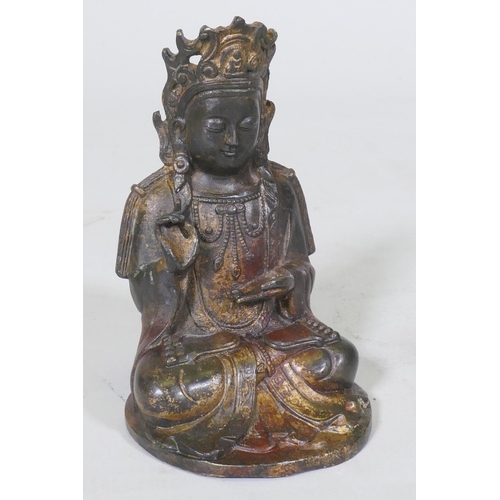 187 - An oriental bronze censer in the form of a lotus with Buddivistic figure 24cm high