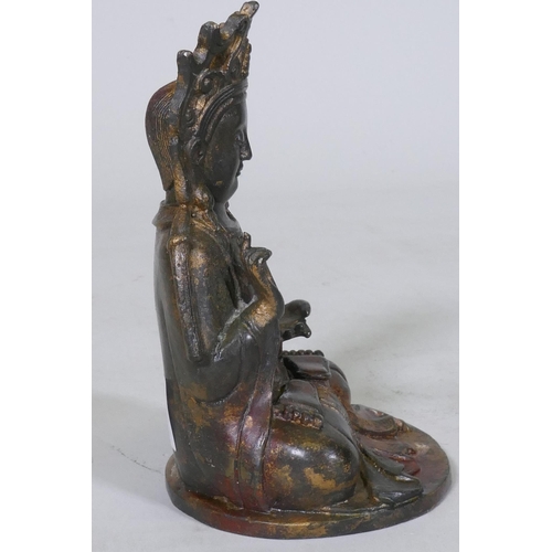 187 - An oriental bronze censer in the form of a lotus with Buddivistic figure 24cm high