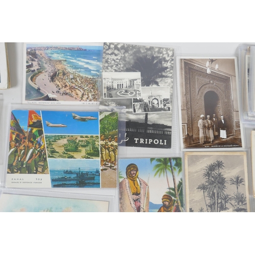 190 - A quantity of early to mid C20th topographical postcards depicting Persia, the Middle East, Nigeria,... 