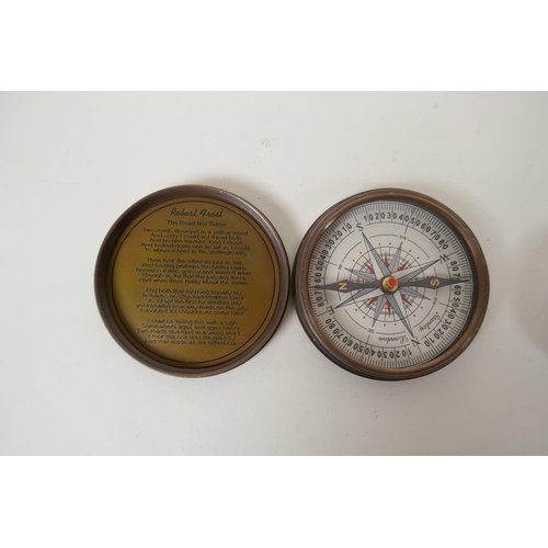 193 - A brass cased 100 year calendar and compass, together with a reproduction 1930s brass marine pocket ... 