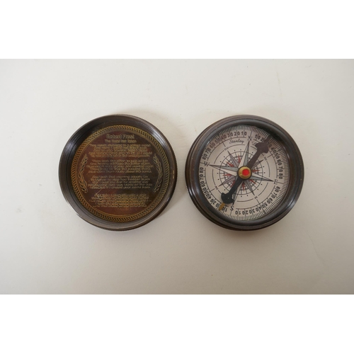 193 - A brass cased 100 year calendar and compass, together with a reproduction 1930s brass marine pocket ... 