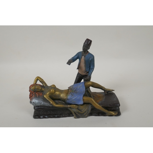 195 - In the manner of Bergmann, a cold painted bronze figure of a Moor and a female nude, 20cm long