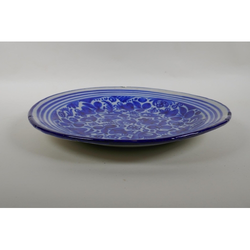 197 - An C18th/C19th Delft blue and white charger, 32.5cm diameter