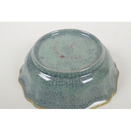 200 - A Chinese celadon Ge ware bowl with frilled gilt rim and chased character inscription to bowl, 20cm ... 