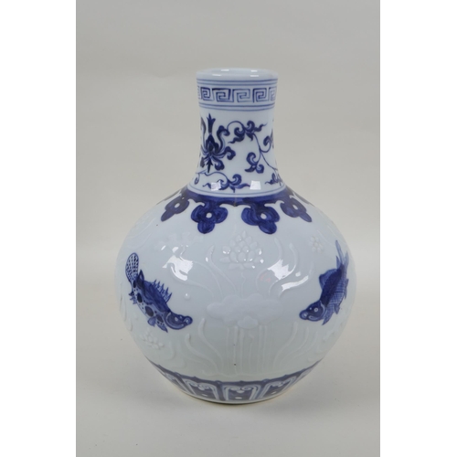 201 - A blue and while porcelain vase decorated with carp and underglaze lotus flowers, Chinese Xuande 6 c... 