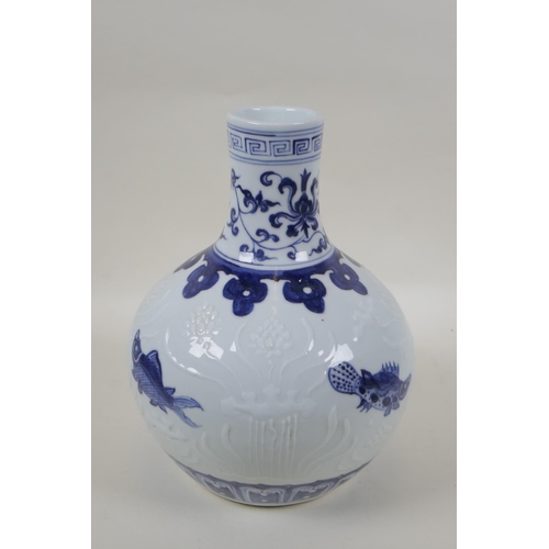 201 - A blue and while porcelain vase decorated with carp and underglaze lotus flowers, Chinese Xuande 6 c... 