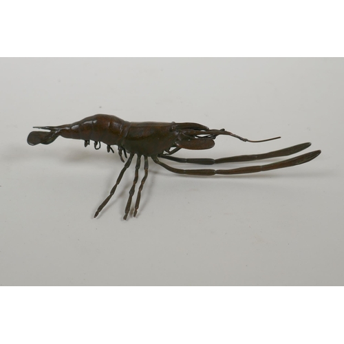 205 - A Japanese style bronze okimono cray fish, 14cm long