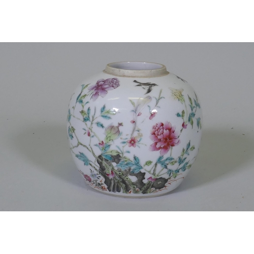 207 - An antique Chinese famille verte storage jar, with enamel painted decoration of a rock garden, and c... 