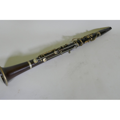 21 - Hawkes & Son clarinet, 66cm long