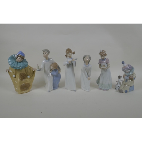 217 - Four Lladro figures of children, another of a clown, and a Nao figure of a clown, largest 20cm, AF