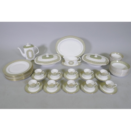 221 - A Royal Doulton  'Sonnet' pattern ten place tea and dinner service, including two tazzas, meat ... 