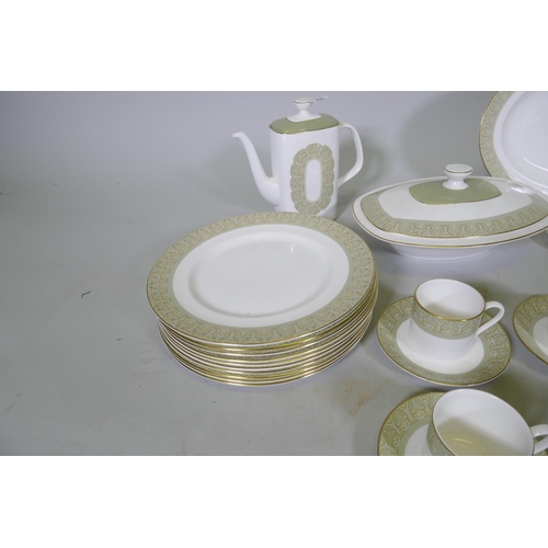 221 - A Royal Doulton  'Sonnet' pattern ten place tea and dinner service, including two tazzas, meat ... 