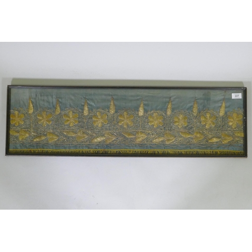 227 - An antique Islamic silk textile, with gilt thread embroidered decoration, 94 x 26cm