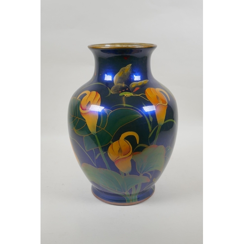 230 - An oriental iridescent blue glazed ceramic vase decorated with lilies, character mark to base, 32cm ... 