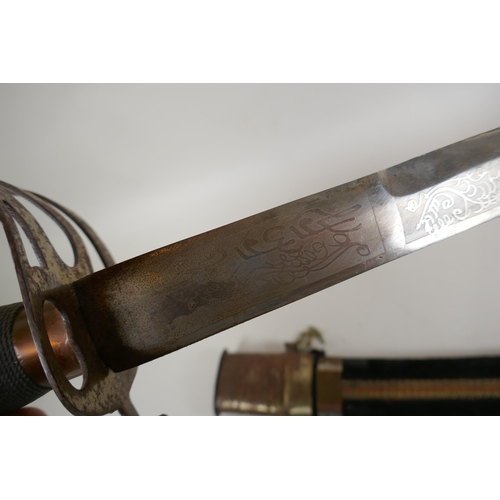 232 - An Indian sabre with brass hilt and copper mounts, together with another smaller, longest blade 75cm