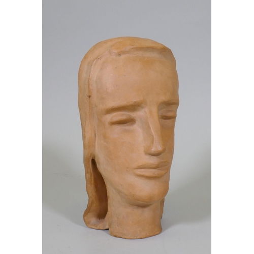 239 - A terracotta sculpture of a female head, inscribed monogram to base, 28cm high