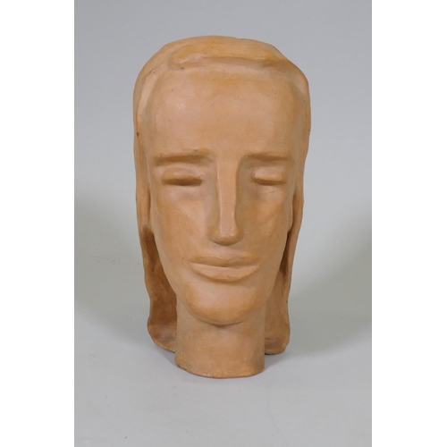 239 - A terracotta sculpture of a female head, inscribed monogram to base, 28cm high