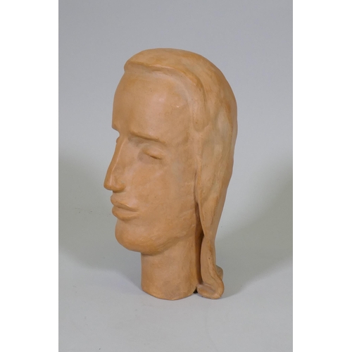 239 - A terracotta sculpture of a female head, inscribed monogram to base, 28cm high