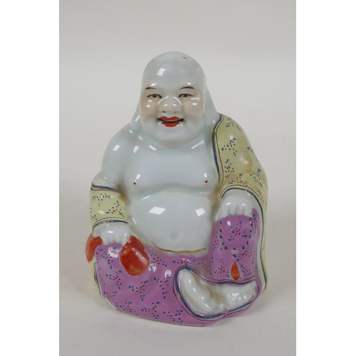 243 - A Chinese blanc de chine porcelain Guan Yin, together with a smaller blanc de chine Buddha and a pol... 