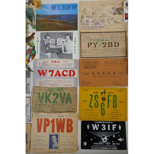 245 - A quantity of assorted ephemera to include vintage scraps for scrapbooking, vintage QSL radio cards ... 