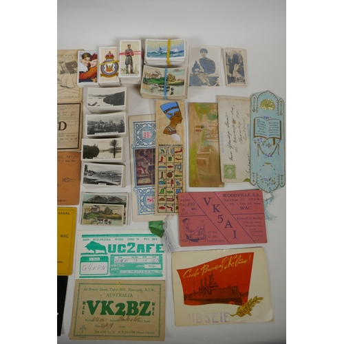 245 - A quantity of assorted ephemera to include vintage scraps for scrapbooking, vintage QSL radio cards ... 