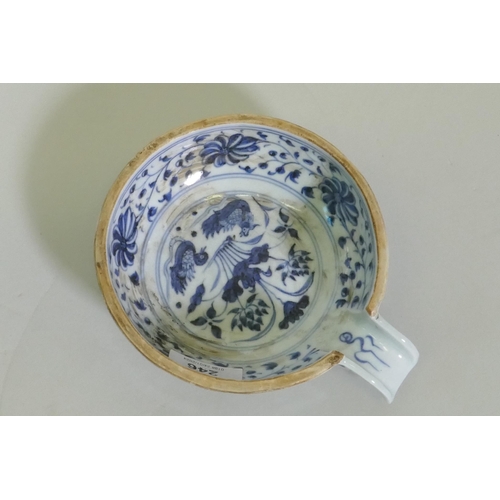 246 - A Chinese blue and ceramic pourer decorated with ducks on a pond, 15cm diameter