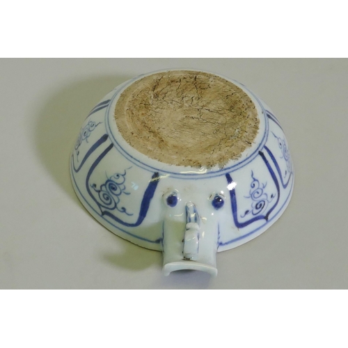 246 - A Chinese blue and ceramic pourer decorated with ducks on a pond, 15cm diameter