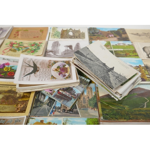 255 - A quantity of late C19th and C20th postcards, mainly UK, including some natural history, and a quant... 