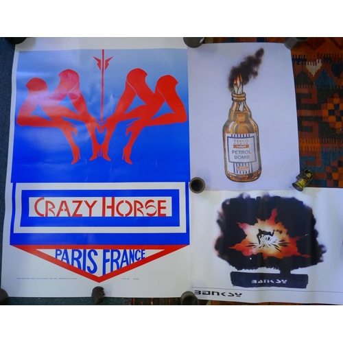 256 - A quantity of music posters, film quad posters and art posters, including Crazy Horse, Banksy, Entra... 