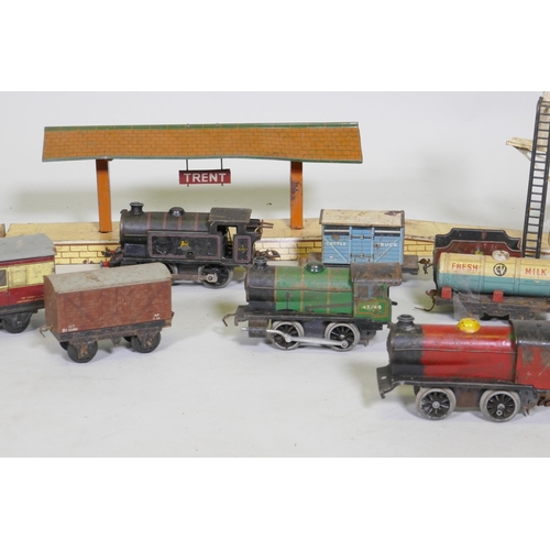 263 - A vintage Hornby, Meccano Ltd O Gauge clockwork railway set, with two type 30 and one type 40 locomo... 