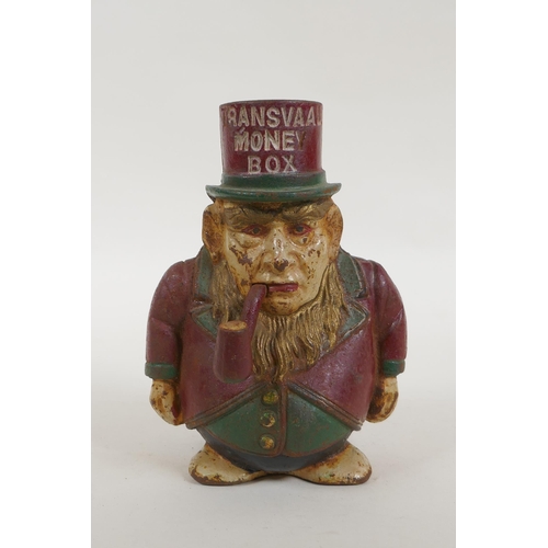 28 - An antique painted cast iron 'Transvaal Money Box' in the form of a caricatured President Kruger, in... 