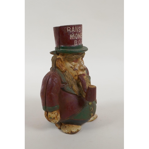 28 - An antique painted cast iron 'Transvaal Money Box' in the form of a caricatured President Kruger, in... 