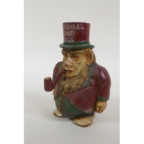 28 - An antique painted cast iron 'Transvaal Money Box' in the form of a caricatured President Kruger, in... 