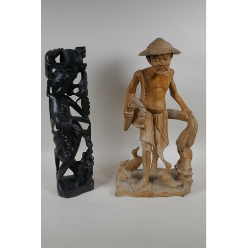 283 - A Balinese carved hardwood figure of a dancer, and an oriental carved wood figure of a duck farmer, ... 