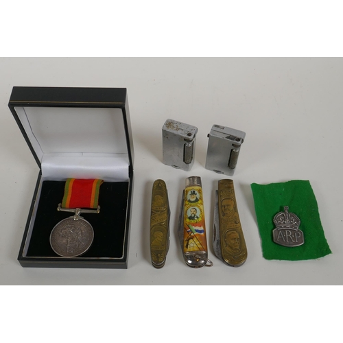 29 - A WWII Africa Service medal awarded to W.R. McLeod 75468, a silver Air Raid Precautions (ARP) lapel ... 