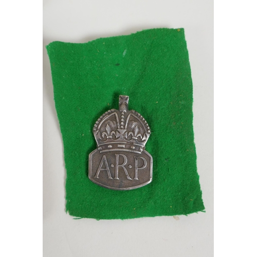 29 - A WWII Africa Service medal awarded to W.R. McLeod 75468, a silver Air Raid Precautions (ARP) lapel ... 