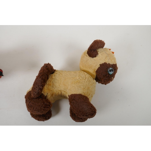 294 - A vintage Merrythought plush brown point Siamese cat, and a velvet toy Dachshund, possibly Merrythou... 