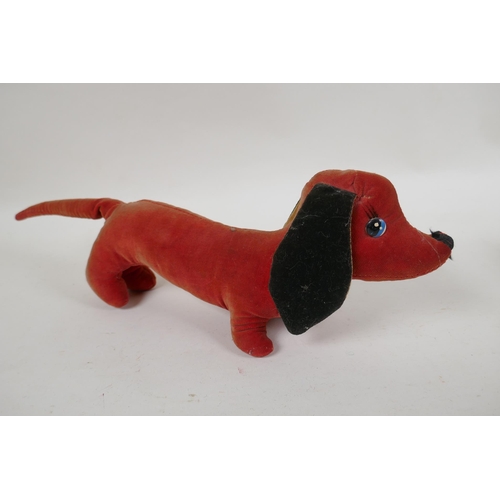 294 - A vintage Merrythought plush brown point Siamese cat, and a velvet toy Dachshund, possibly Merrythou... 