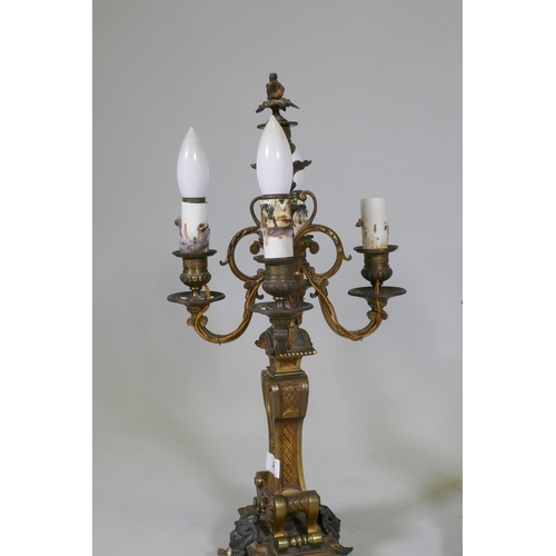 295 - A pair of ormolu and bronze four branch candelabra lamps, one arm AF, 58cm high